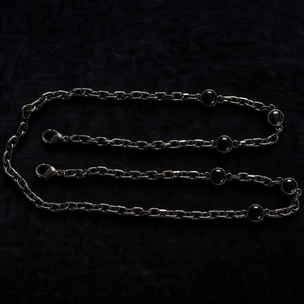 WOOJIN ATELIER — Black Nickel NF (BNK NF) shiny finish. High-gloss gunmetal surface with crisp specular highlights across all link sizes. Nickel-free electroplating for luxury handbag hardware.