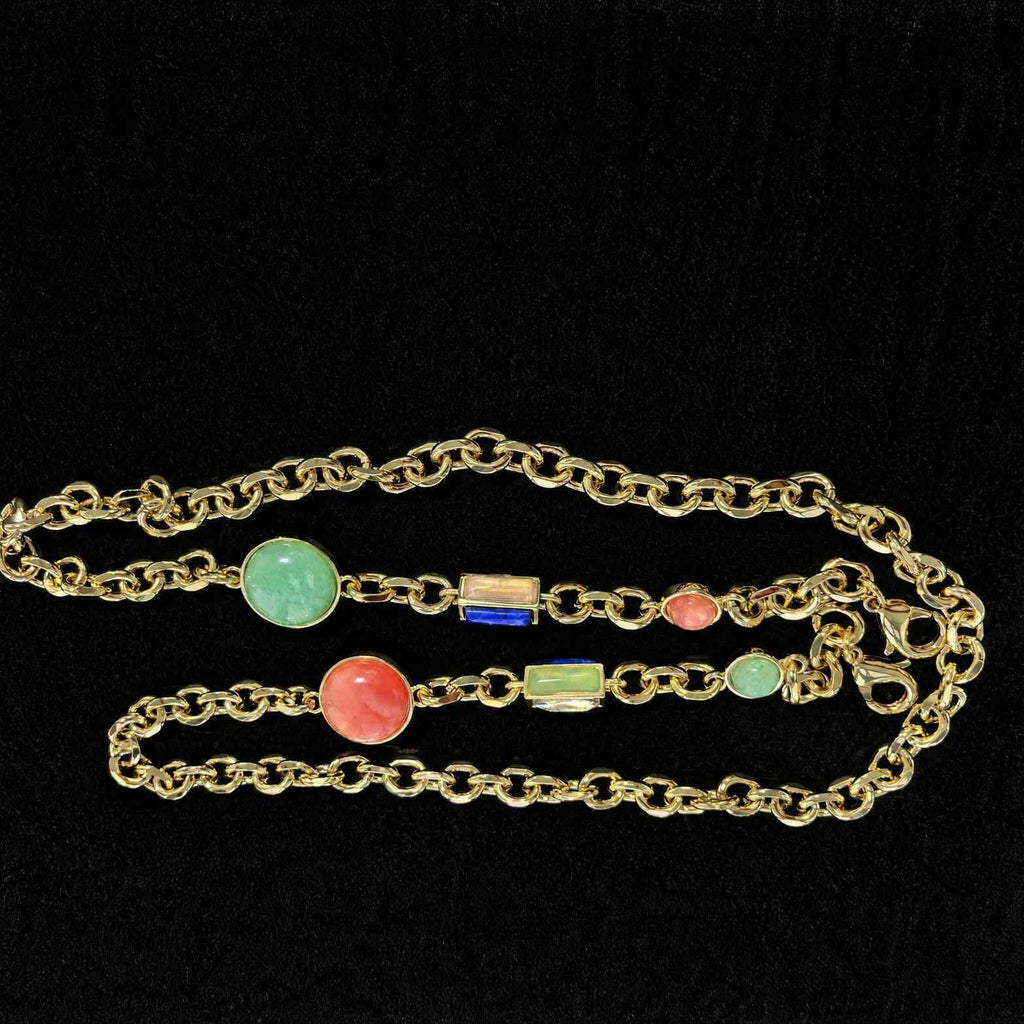 WOOJIN ATELIER — Champagne 14K NF rolo chain with mixed cabochon and faceted stone settings. Chrysoprase, coral, lapis, and yellow glass stones hand-set in gold bezel mounts. Multi-component chain assembly for luxury handbag hardware.